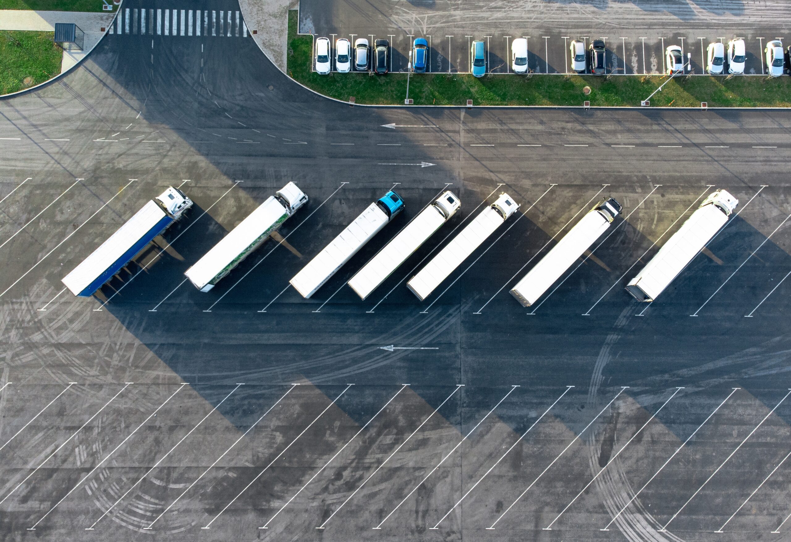 Aerial,View,Of,Trucks,Parked,In,The,Parking,Lot.,Directly